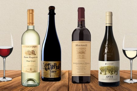 Assortment of wines on beige background