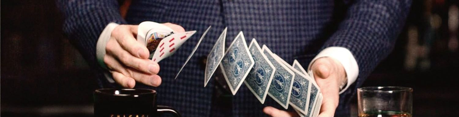 magician shuffling cards