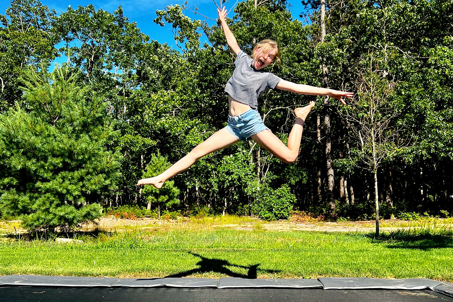 girl jumping on a trampoline