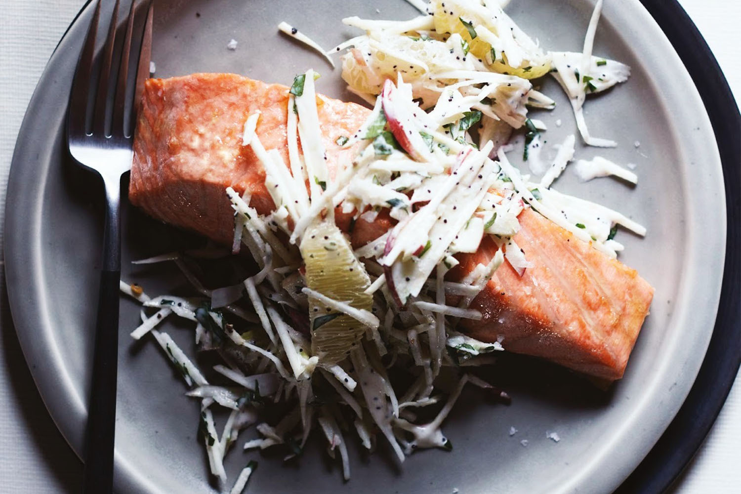Salmon and slaw meal on a plate