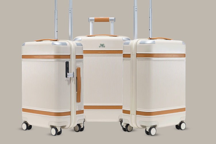 Paravel Aviator Carry-On Plus on beige background