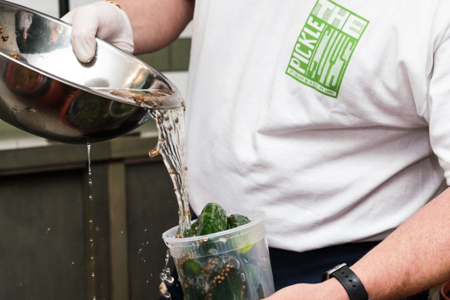 pour pickle brine into a jar