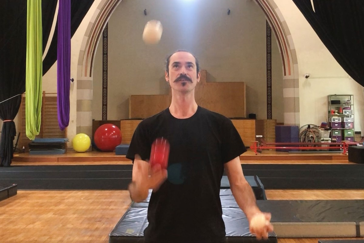 Luther Bangert demonstrating how to juggle