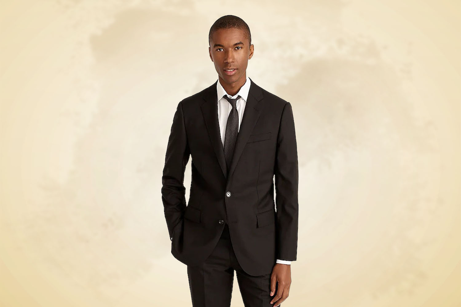 A man posing in a suit.