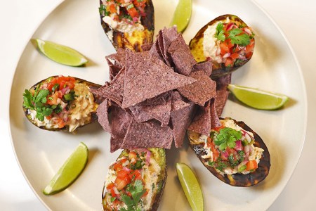 Grilled avocado with crab on dish