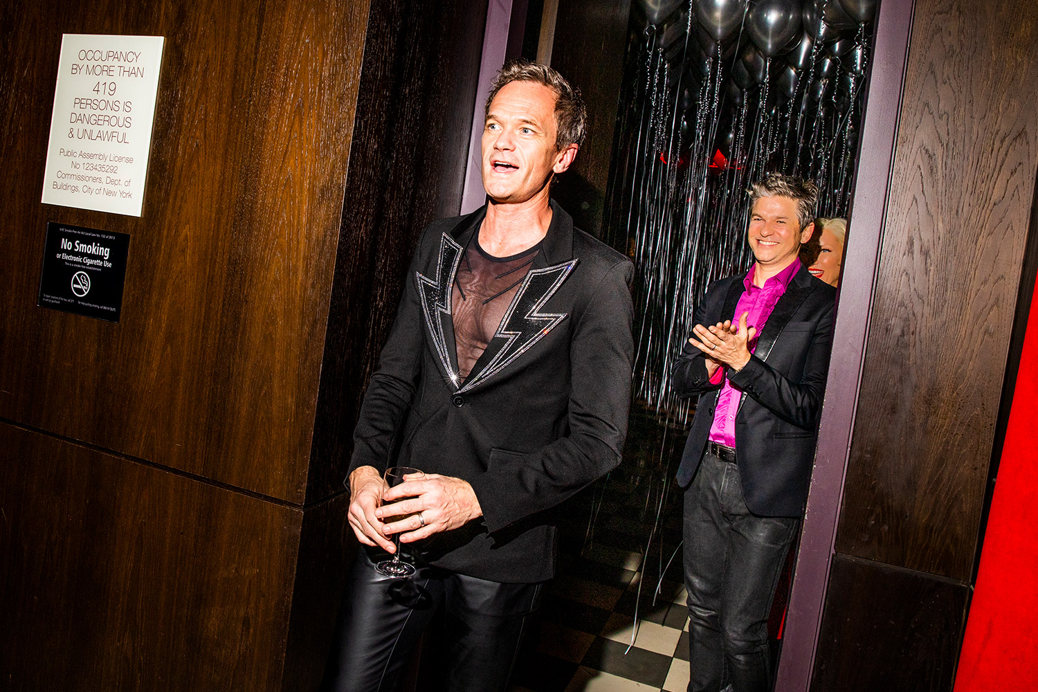 Neil Patrick Harris walking into birthday party