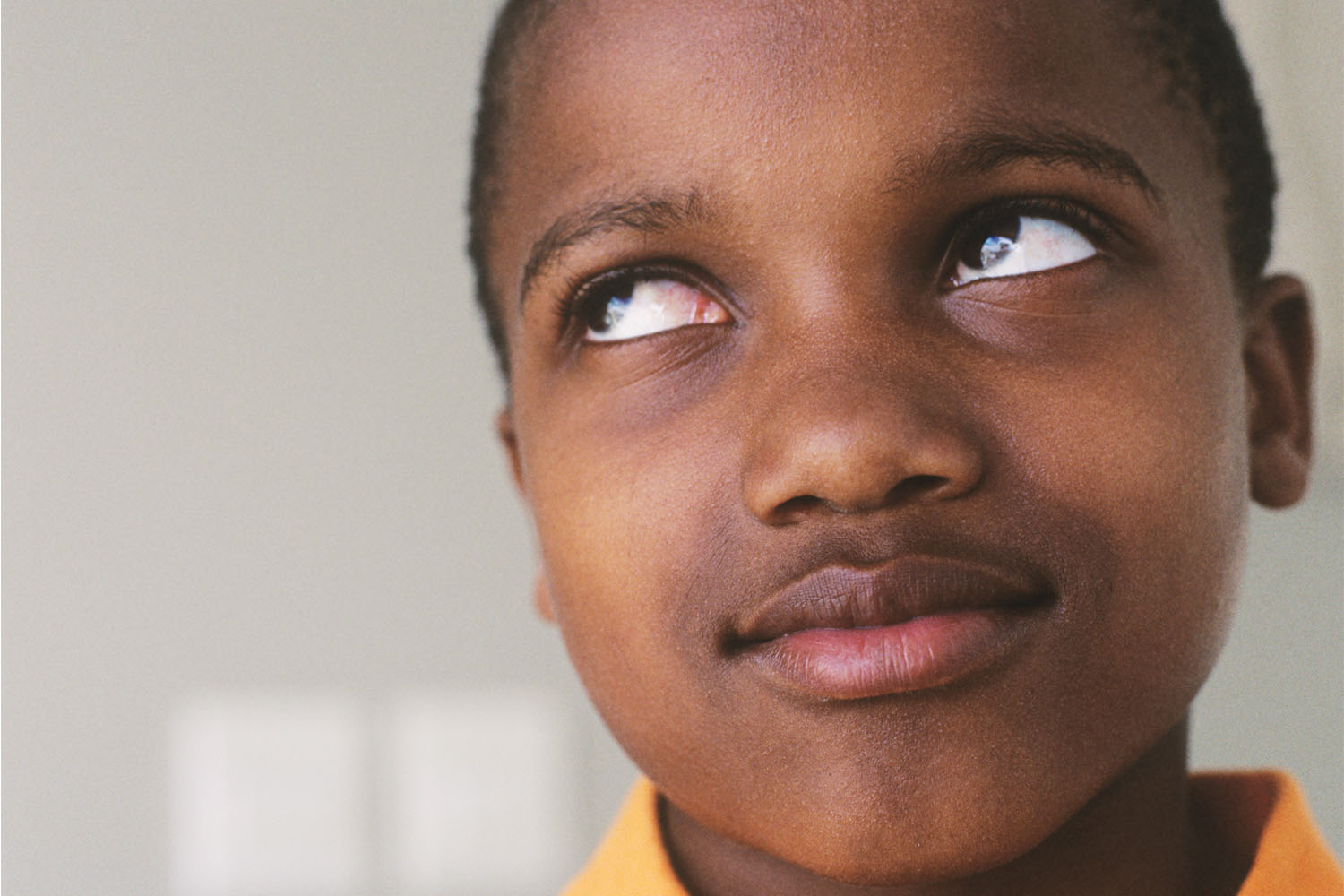 kid rolling his eyes.