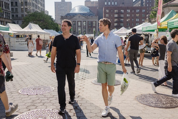 Mike and David walking at the Farmer's Market in Union Square.