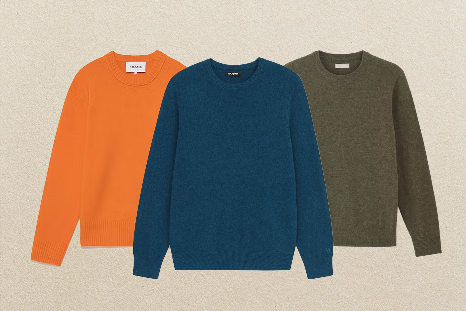 An orange, blue, and green sweater on beige background