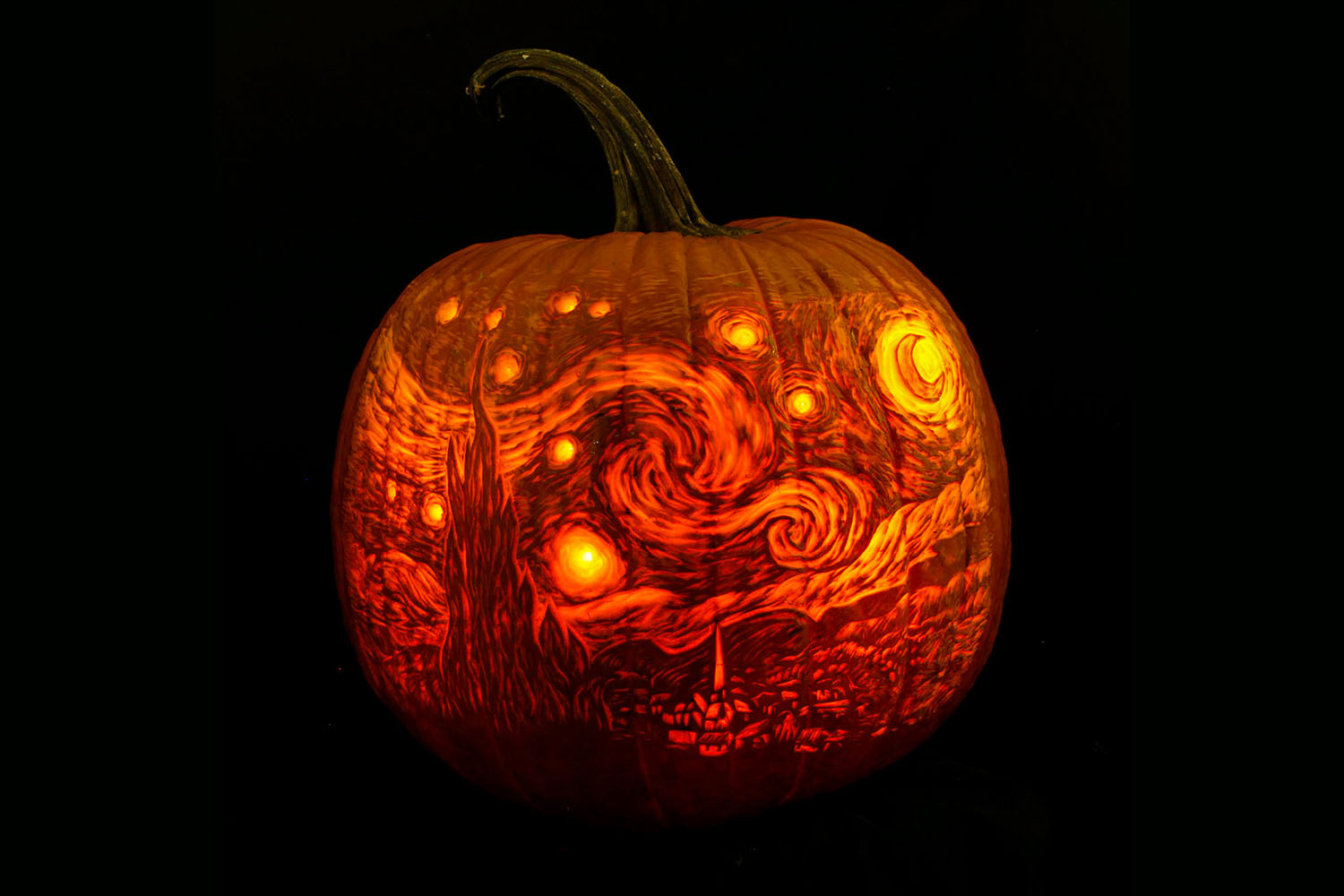 Starry night painting carved into a pumpkin