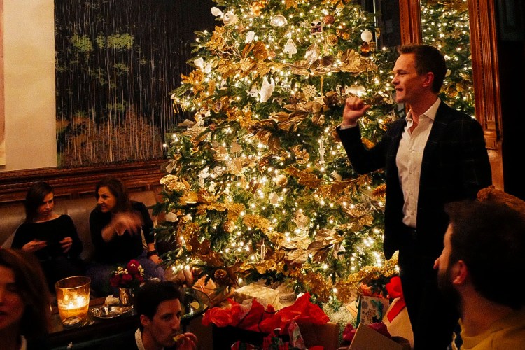 NPH in front of Christmas tree