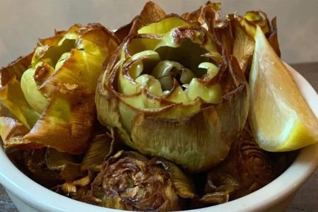 Bowl of cooked artichokes