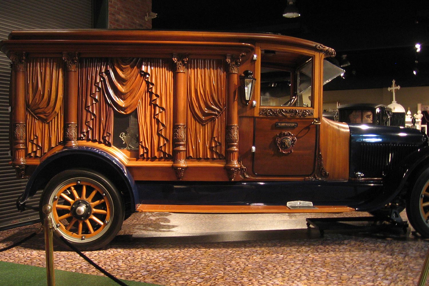 A vintage 1921 wood carved hearse
